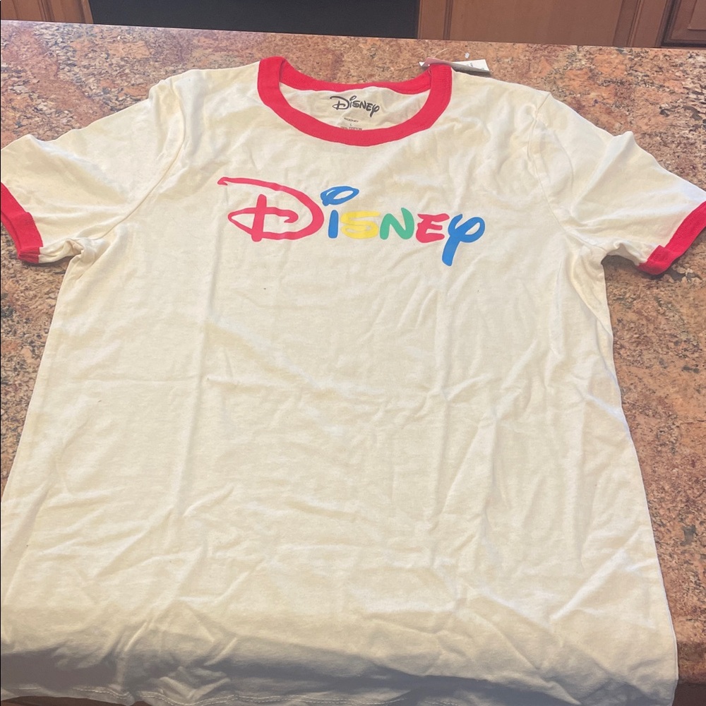 NWT Disney cream Tee with Red Trim and Colorful Logo